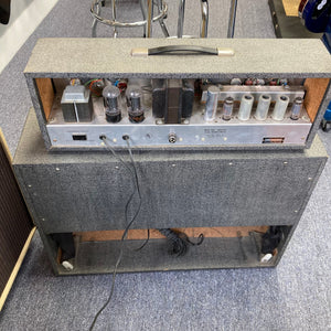 Silvertone Model 1484 Twin Twelve 60-Watt 2x12 Guitar Amp with vintage tubes and wires, showcasing a retro design and built-in tremolo effect.