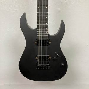 Spira S-407 MBK Matte Black Electric Guitar, featuring seven strings, dual humbuckers, and satin finish, showcasing sleek design and extended range for versatile playability.