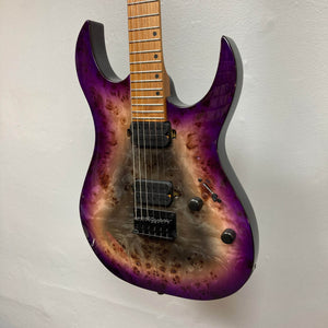 A close-up of a Spira S-450 Trans Purple TPP electric guitar by Spira, featuring Villain humbuckers, three control knobs, a maple fretboard with a modern D profile neck, and natural wood grain against a plain white wall.