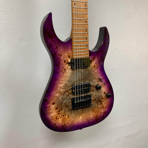 Spira S-457 TPP Trans Purple Burst Electric Guitar with 7 strings, burl top, maple neck, and custom humbuckers, hanging on display at Guitars on Main.
