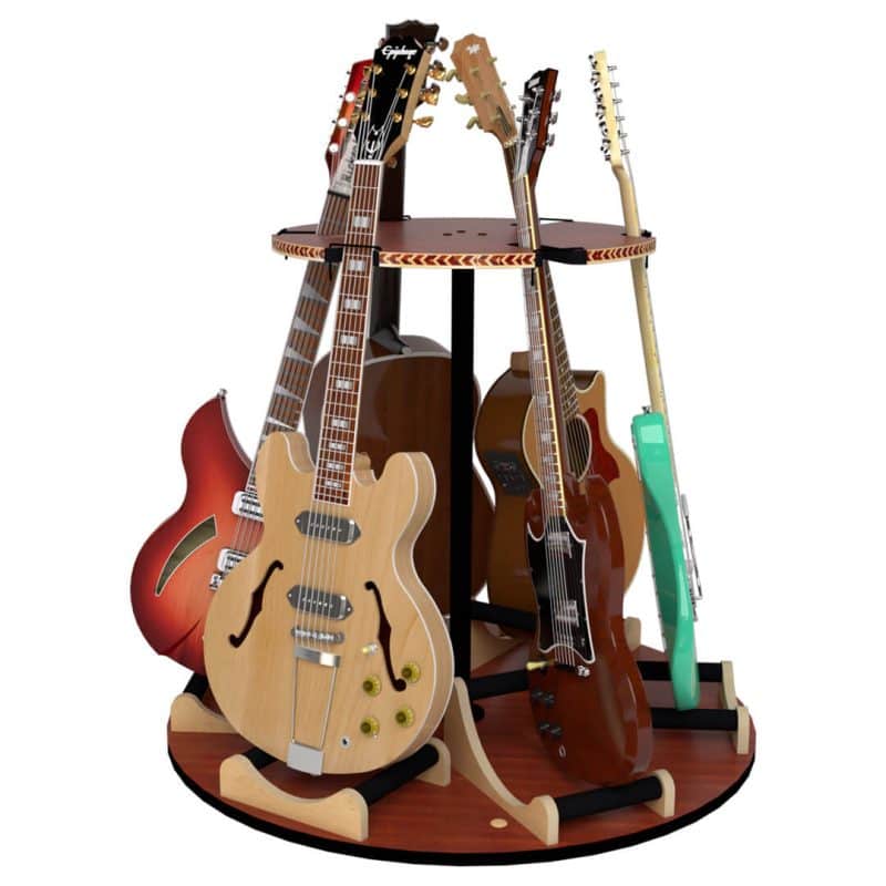 The Carousel™ Deluxe Rotating Guitar Stand by A&S Crafted Products securely displays six guitars of different styles and colors upright, evenly spaced around the rotating stand.