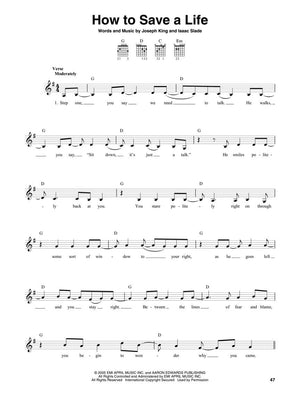 The Guitar 4-Chord Songbook G-C-D-Em Softcover, featuring sheet music with text and notes for fifty popular songs with only four chords.