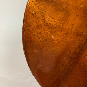 Close-up of the Travis Bean TB1000A Artist Natural 1970s guitar, highlighting the wood surface and vintage condition. Includes original pickups, aluminum neck, and case.