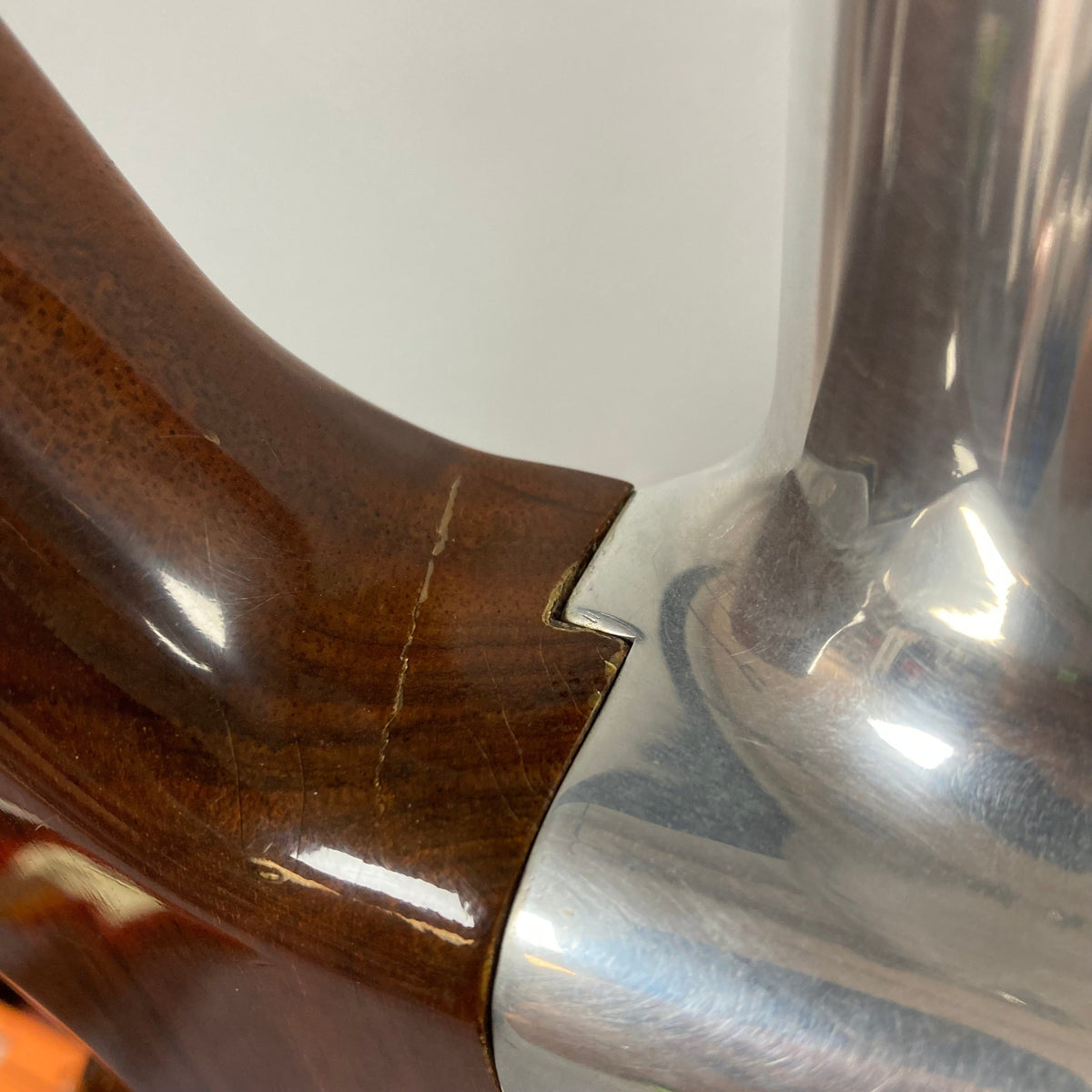 Travis Bean TB1000A Artist Natural 1970s guitar with aluminum neck and wood body, featuring original pickups and notable wear, shown in close-up.