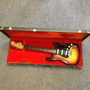 1976 Fender Stratocaster Sunburst in original case with paperwork and accessories, showcasing great condition and original parts.