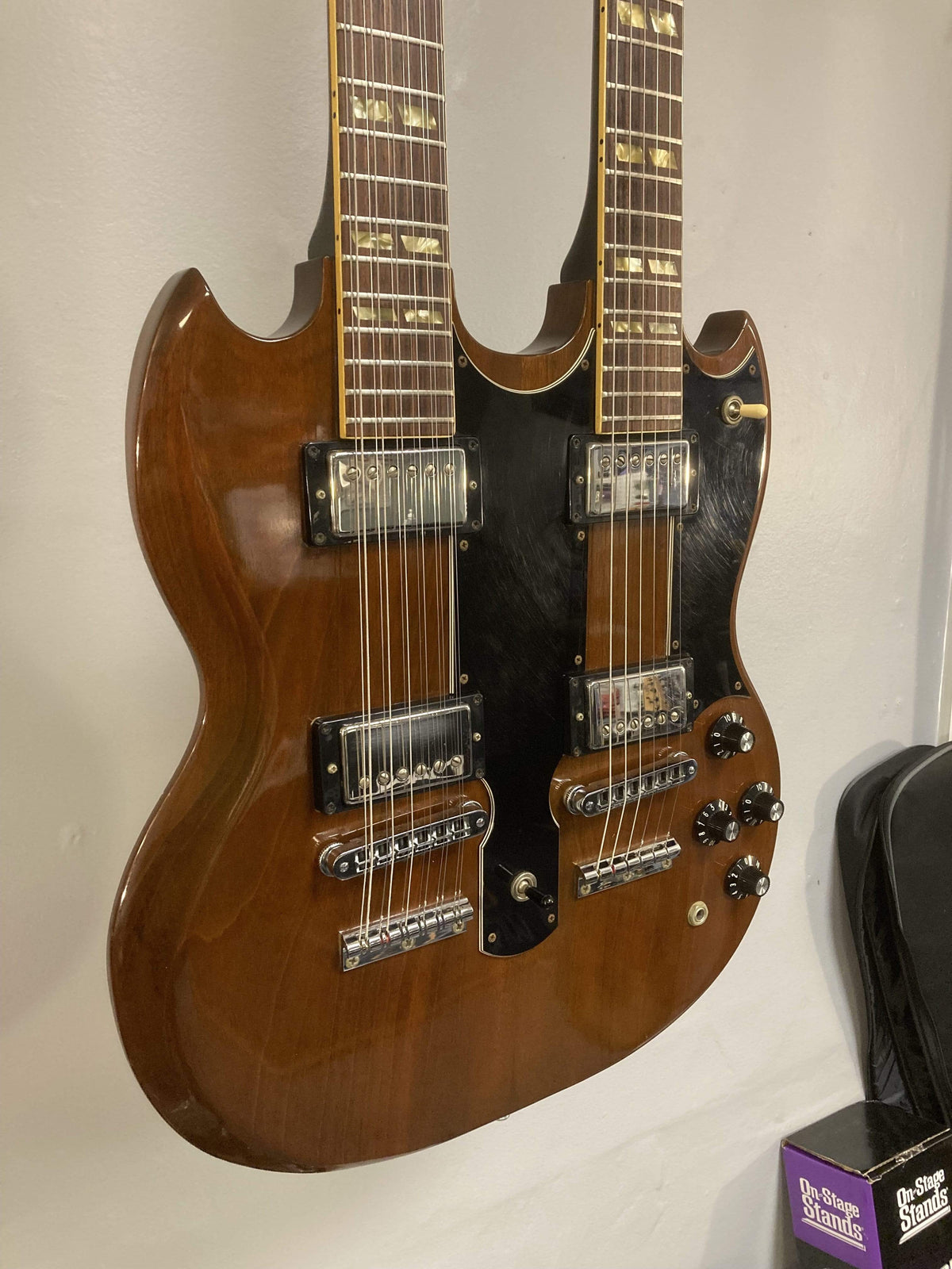 1980 Gibson EDS-1275 Double Neck Electric Guitar on display, highlighting its dual-neck design and pristine condition.
