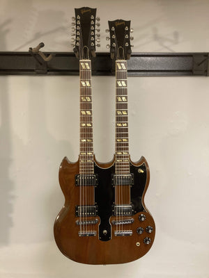 1980 Gibson EDS-1275 Double Neck Electric Guitar on display, featuring minor wear, double necks, and original case included.
