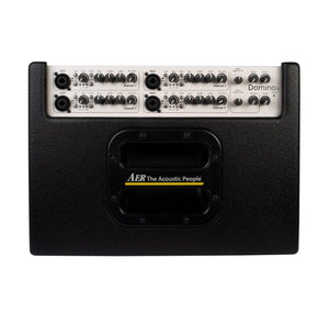 AER Domino 3 Acoustic Amplifier, featuring dual speakers, multiple effect units, and a sleek black and silver design with control knobs.