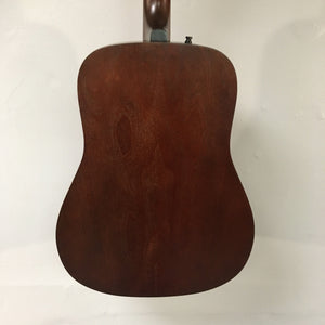 Art & Lutherie Americana Bourbon Burst acoustic-electric guitar, showcasing close-up of wood craftsmanship and strings, highlighting its sturdy build and integrated electronics.
