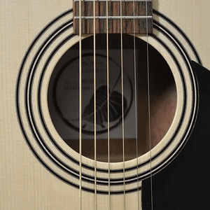 Close-up of a Bodhi BG10E Spruce Top Concert Body Acoustic-Electric Guitar’s sound hole, showing six strings, light spruce mahogany body with black and white rings, and part of the pickguard on the right.