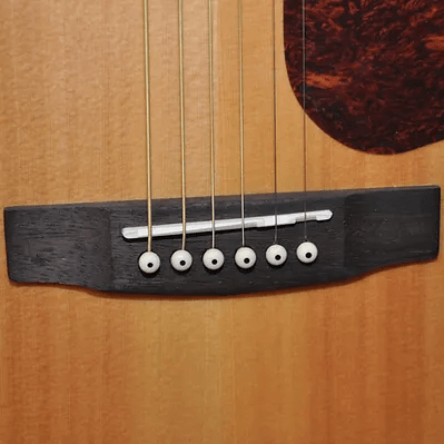 Bodhi BG10S Solid Spruce Top Concert Body Acoustic Guitar, close-up of strings and fretboard, showcasing craftsmanship and design.