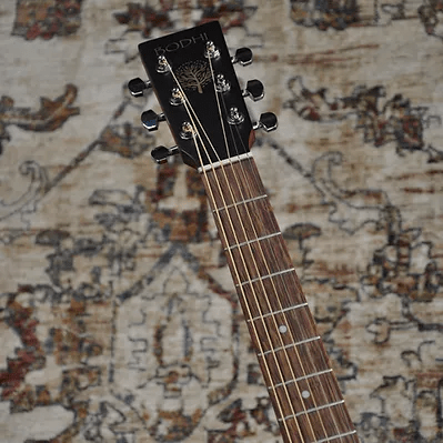 Bodhi BG20 Acoustic Guitar close-up, showcasing its detailed fretboard and neck design for exceptional projection, volume, and sustain.