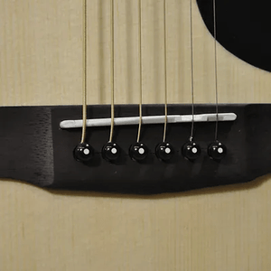 Close-up of Bodhi BG20E Spruce Top Dreadnaught Body Acoustic-Electric Guitar, highlighting strings and craftsmanship details.