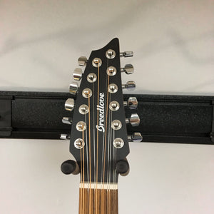 Breedlove Discovery S Concert CE 12-string Edgeburst guitar headstock with silver tuning knobs and African mahogany neck, close-up on tuning hardware.