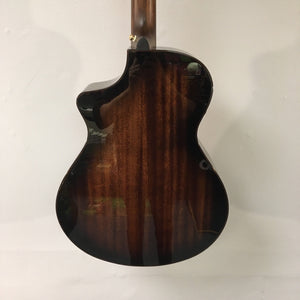 Breedlove Performer Pro Concert Aged Toner CE guitar close-up, highlighting strings and body, designed for versatile musical styles.