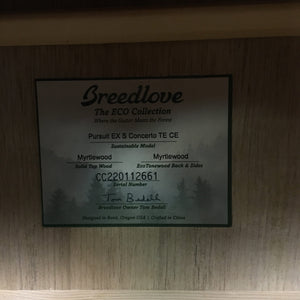 Breedlove Pursuit Exotic S Concerto CE Tiger's Eye Myrtlewood B-Stock acoustic guitar with visible finish blemishes on the binding.