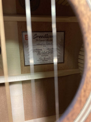 Close-up of Breedlove Wildwood Concerto Satin CE guitar, showcasing its solid African mahogany body and intricate craftsmanship.