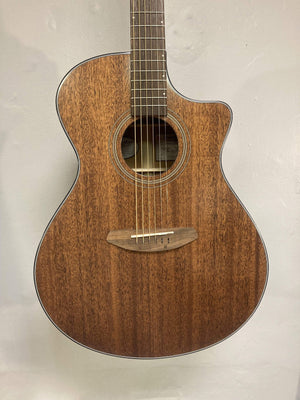 Close-up of Breedlove Wildwood Concerto Satin CE guitar, showcasing solid African mahogany body and strings.