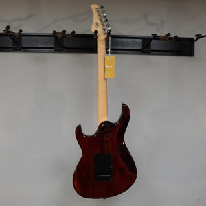 Cort G280 Select Trans Black electric guitar with pearloid pickguard and Rosewood fingerboard, displayed on a wall.