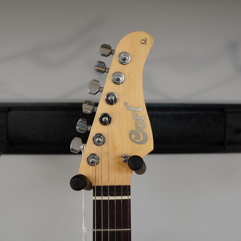 Close-up of the Cort G280 Select Trans Black guitar neck and headstock, showcasing its Rosewood fingerboard and Voiced Tone VTH-77 humbucker.