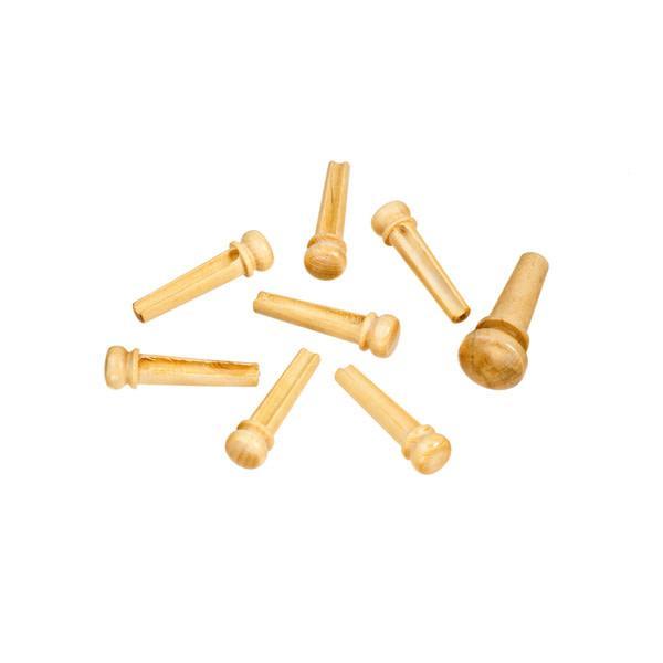 D'Addario Boxwood Bridge Pins for acoustic guitars, crafted from genuine boxwood, displayed in a grouped arrangement.