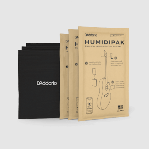 D'Addario Humidipak Maintain Replacement Packet 3-pack shown with instruction booklet, black and white logo, and violin drawing, for maintaining guitar humidity.