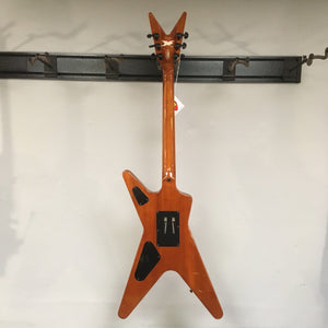 Dean Dimebag Dime Slime ML electric guitar with Floyd Rose tremolo, displayed on a wall.