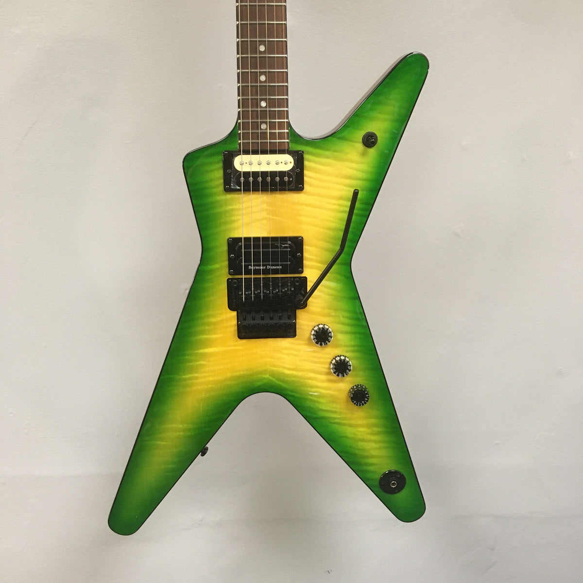 Dean Dimebag Dime Slime ML electric guitar with Floyd Rose Special bridge, V profile neck, and abalone dot inlays.