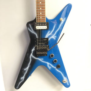 Dean Dime From Hell ML electric guitar with lightning bolt design, featuring a V headstock, dual humbuckers, and Floyd Rose bridge.