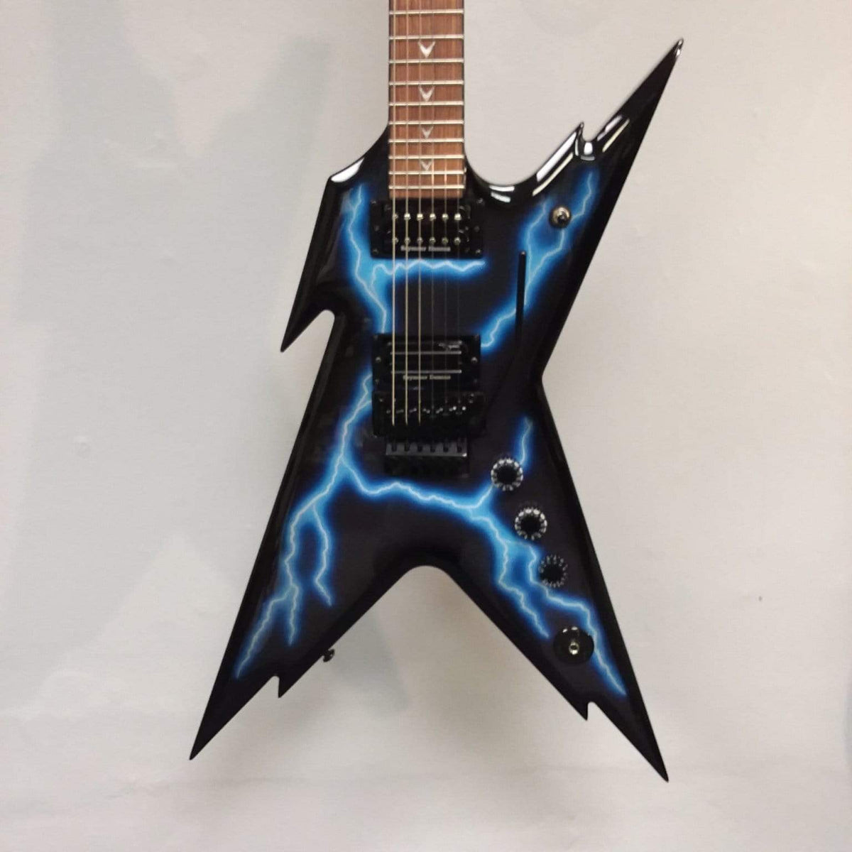 Dean Razorback Lightning B Stock electric guitar with blue lightning design, featuring Seymour Duncan pickups and Floyd Rose tremolo.