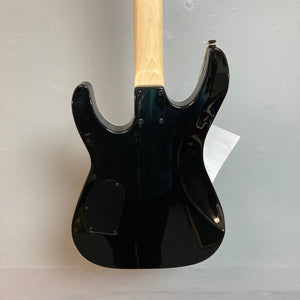 Dean MD X Quilt Maple Trans Blue Burst electric guitar with wood neck and black hardware, showcasing high-output zebra pickups and a flat top design.