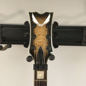 Dean Thoroughbred Select Quilt-top guitar with Floyd Rose bridge, featuring satin finished neck and Seymour Duncan pickups, close-up of guitar head and strings.