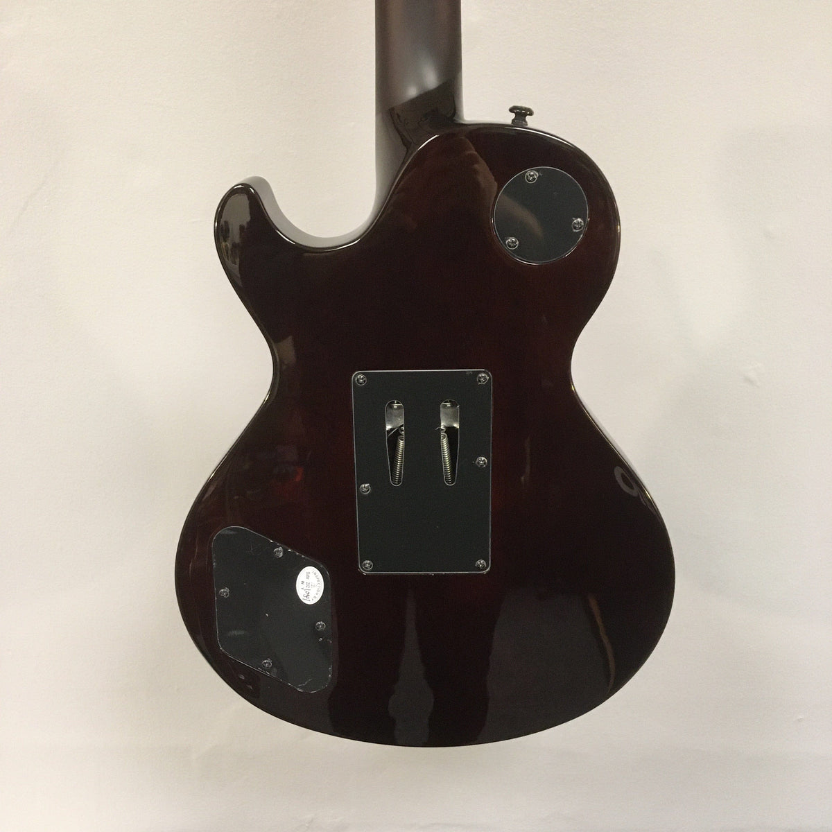 Close-up of Dean Thoroughbred Select Quilt-top guitar with Floyd Rose bridge and Seymour Duncan pickups.