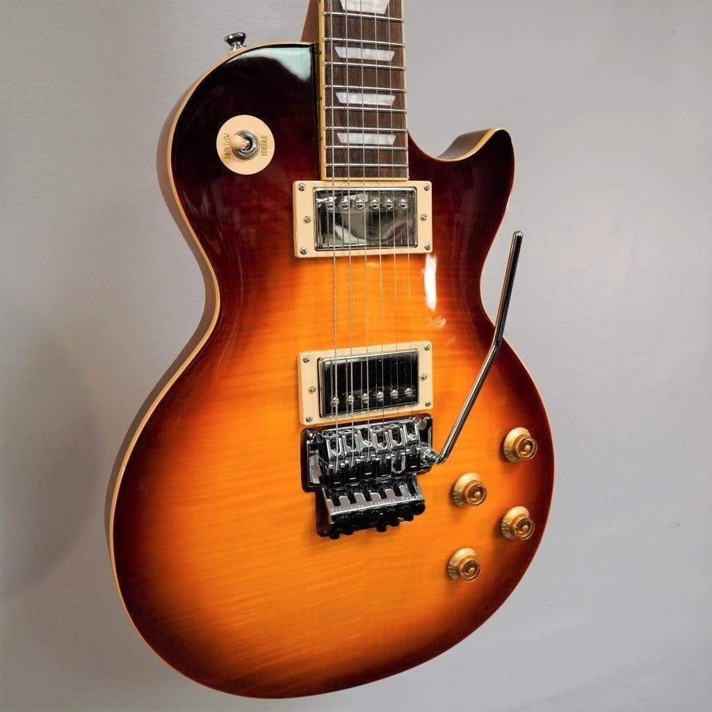 Epiphone Alex Lifeson Les Paul Axcess Standard electric guitar with multiple control knobs and a sleek Viceroy Brown finish.