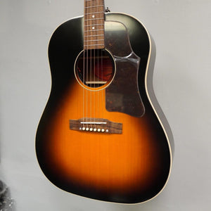Epiphone Masterbilt J-45 Aged Vintage Sunburst Gloss acoustic guitar on display, featuring solid wood construction and Fishman Sonicore pickup.