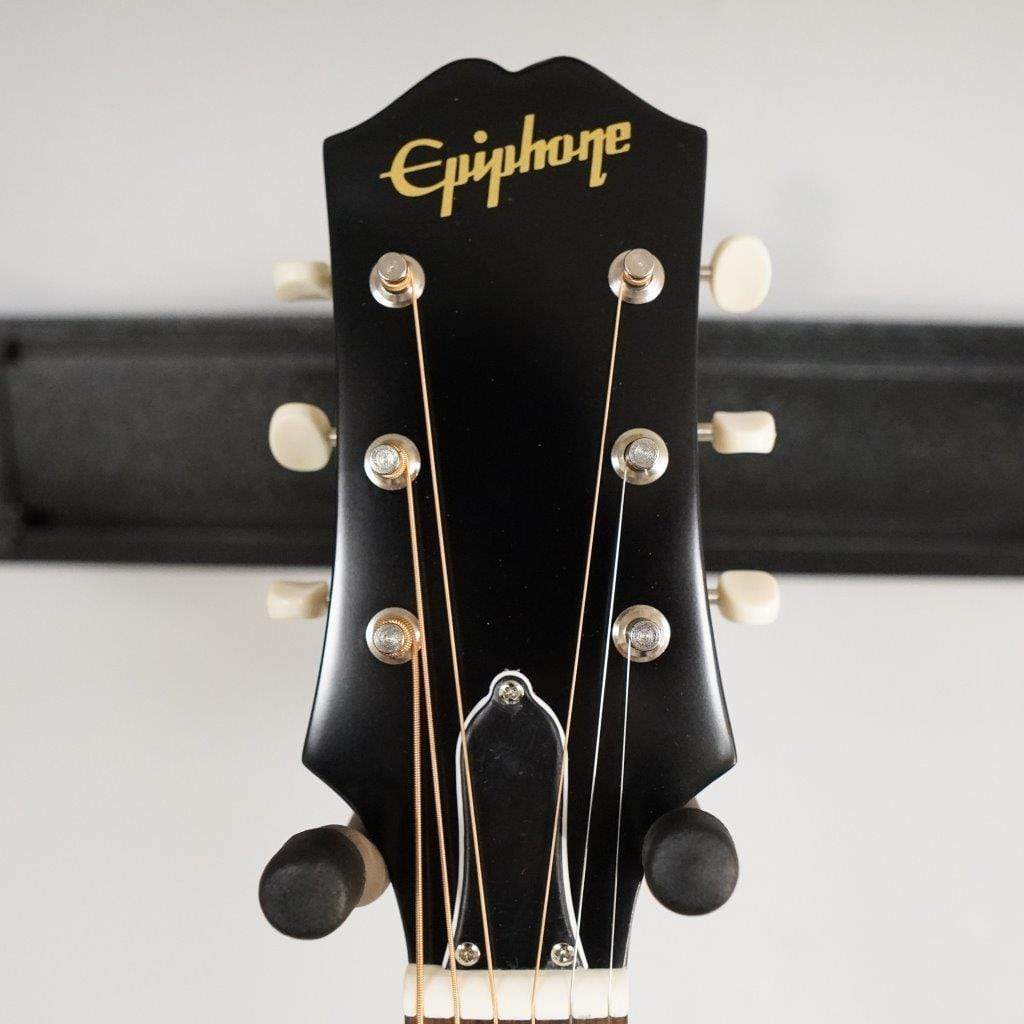 Epiphone Masterbilt J-45 Aged Vintage Sunburst Gloss, featuring the guitar headstock, tuning pegs, and neck close-up, highlighting craftsmanship and detail.