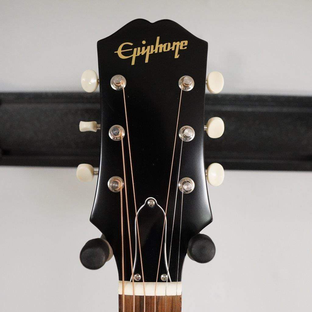 Epiphone Masterbilt J-45 EC Aged Vintage Sunburst Gloss guitar head with tuning pegs and strings, showcasing the rounded C neck and solid wood craftsmanship.