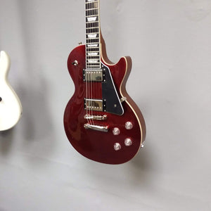 Epiphone Les Paul Modern - Vintage Sparkling Burgundy displayed on a wall, highlighting its sleek design and modern features.