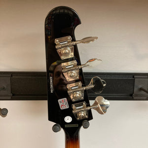 Epiphone Thunderbird IV Reverse Headstock Vintage Sunburst bass guitar close-up, showcasing its distinct body design and craftsmanship.