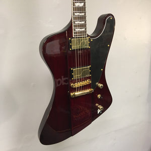 Close-up of ESP LTD Phoenix-1000 electric guitar in See Thru Black Cherry with gold hardware and Fishman Fluence Modern Humbucker pickups.