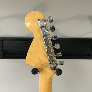 1976 Fender Strat Sunburst, all original with case and paperwork, close-up of guitar neck and body, showcasing silver knobs and metal parts.