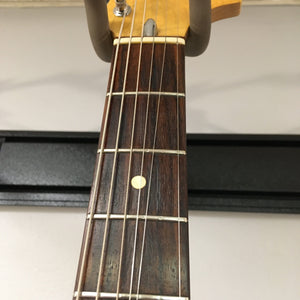 1976 Fender Stratocaster Sunburst, close-up of neck and strings, all original parts, with case and paperwork included.
