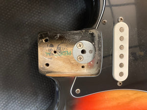 1976 Fender Stratocaster Sunburst, close-up of bridge and screws, all original parts, great condition, includes original case and paperwork.