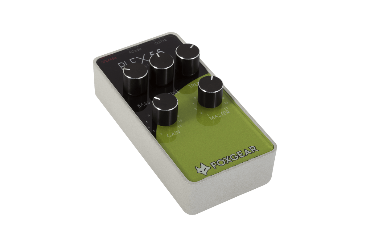 Close-up of the Foxgear Plex 55 preamp's black and silver control knob, designed to emulate classic tube amp tones with harmonic richness.