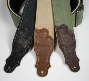 Close-up of Franklin 2” Distressed Cotton Canvas/Glove Leather End Tab belt with a durable cotton webbing and heavy-duty distressed chrome slider.
