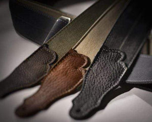 Close-up of Franklin 2” Distressed Cotton Canvas/Glove Leather End Tab belt, showcasing durable leather straps and heavy-duty chrome slider.