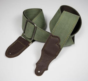 Franklin 2” Distressed Cotton Canvas/Glove Leather End Tab guitar strap with a green fabric and brown leather accents, featuring durable craftsmanship and a heavy-duty chrome slider.