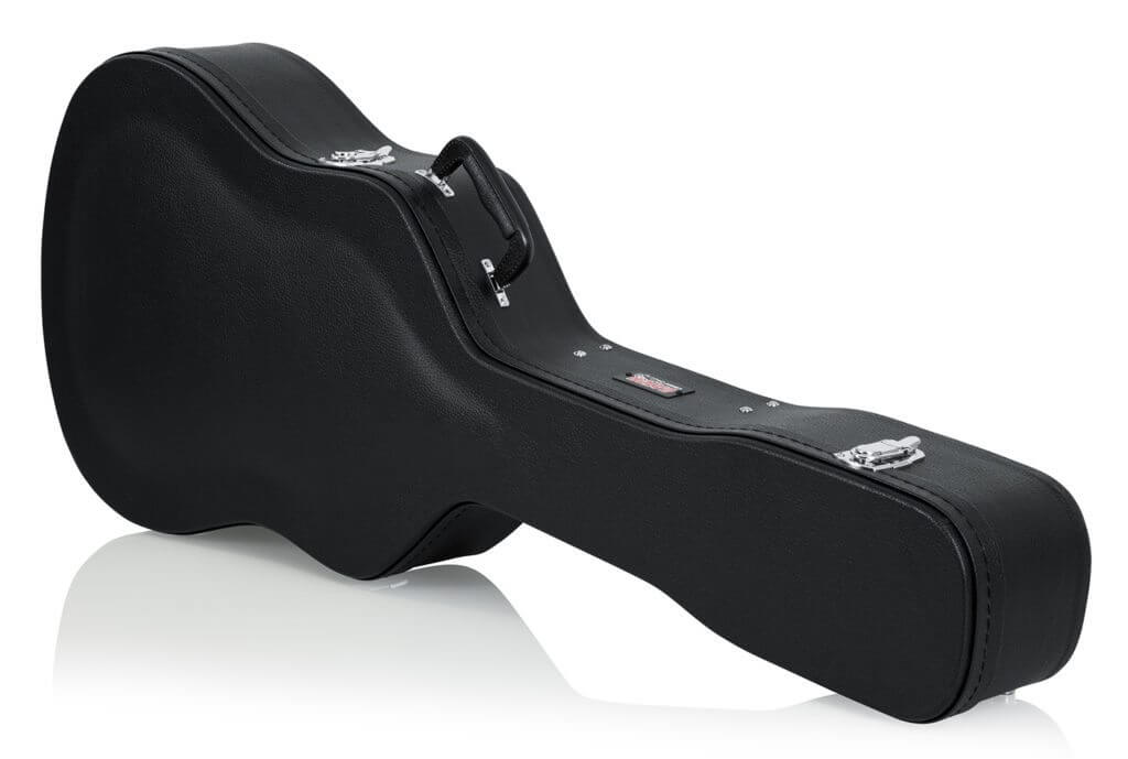 Gator 12-String Dreadnought Case: black hard-shell case with a handle and chrome latches, designed to protect 12-string guitars from impact and moisture.
