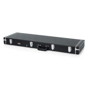 The Gator Deluxe Wood Bass Guitar Case by Gator, rectangular and black with metal latches and a center handle, offers durable protection for your bass guitar and is displayed on a white background.
