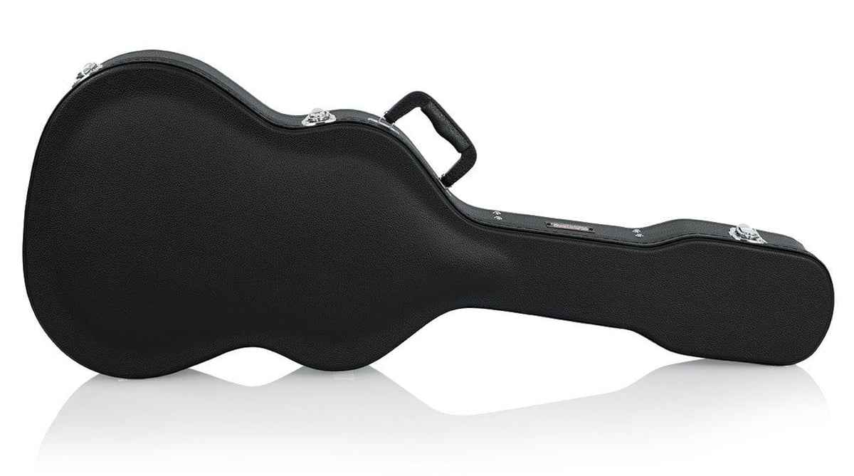 Gator Classical Guitar Case with ergonomic handle, durable arch-topped plywood construction, and thick plush lining for impact protection and accessory storage.
